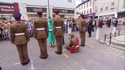 Queen Guard “Fell Down ” During Her Visit!