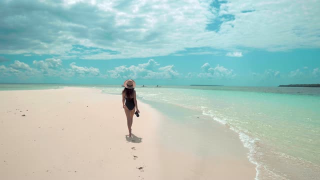 Beach girl in beautiful bikin