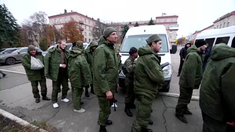 In Russia-held Donetsk, freed POWs return home