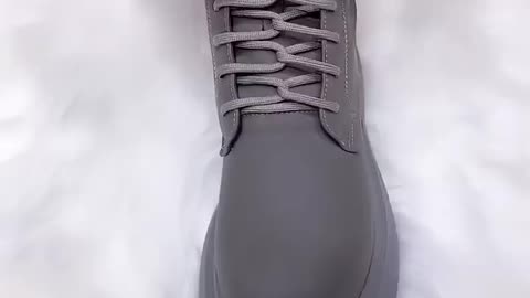 Shoe tying -in two handed technique