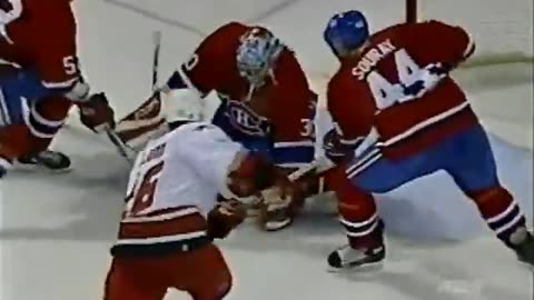 Craig Rivet (Canadiens) FIGHTS Andrew Ladd (Hurricanes)