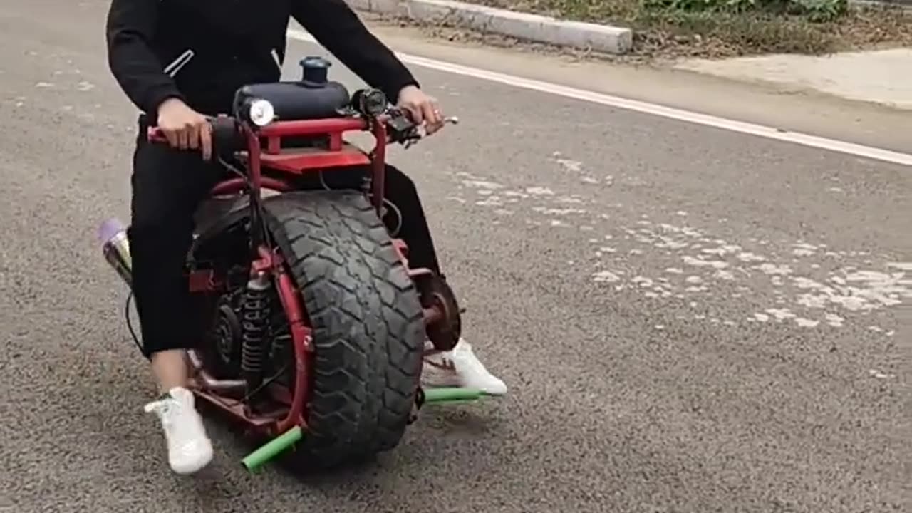 A girl riding a modern bike