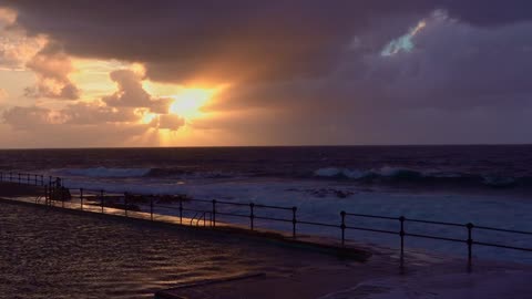 sunset by the ocean