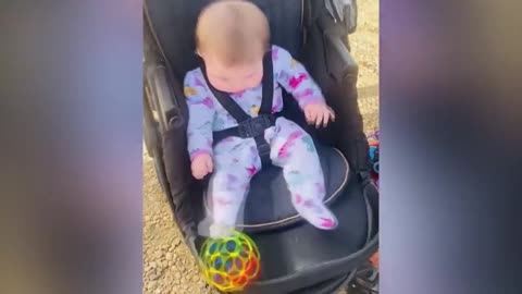 Baby playing soccer while on the baby chair, amazing skills