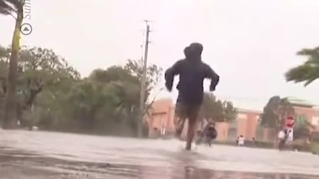 A Sunrise cameraman put his camera down mid broadcast to help people fleeing a huge hurricane