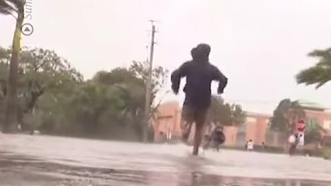 A Sunrise cameraman put his camera down mid broadcast to help people fleeing a huge hurricane