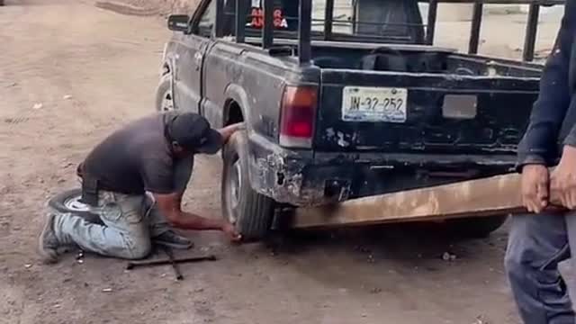 How to change a tire without a jack?