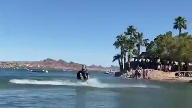 Professional Jet Ski Freerider Amazes Crowd By Doing Multiple Flips on Jet Ski At Beach