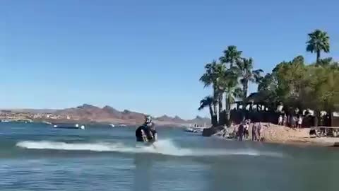 Professional Jet Ski Freerider Amazes Crowd By Doing Multiple Flips on Jet Ski At Beach