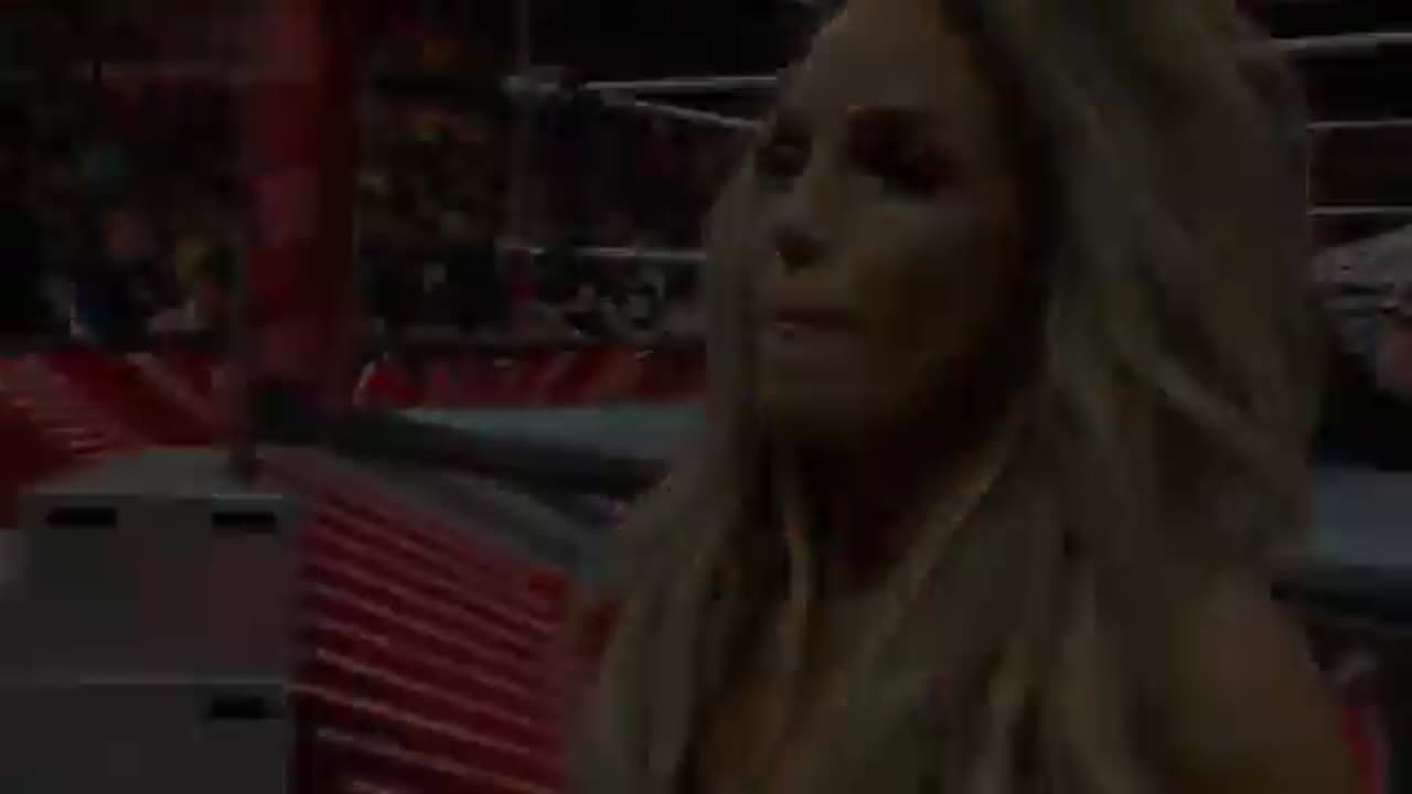 Trish Stratus attacks Becky Lynch after they lost the WWE Women’s Tag Team Titles