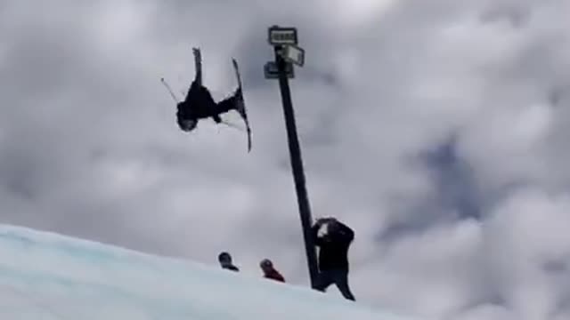 10 year old does a Double corked 10 ski jump flawlessly on the slopes