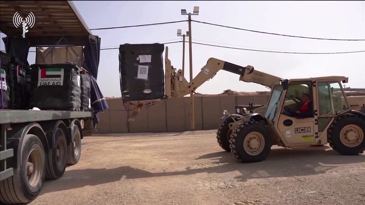 Israeli army shows aid arriving through pier into Gaza