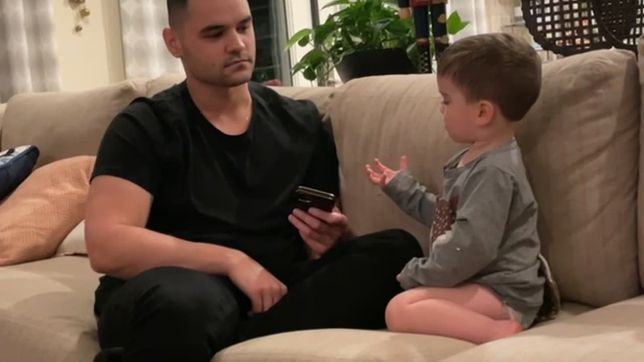 Boy Perplexed By Magic Trick