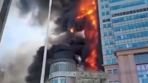 In Tianjin, China, a colossal fire has engulfed the Xintiandi office building.