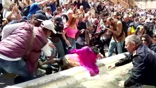 Climate activists turn Rome's Trevi Fountain black