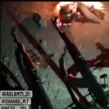 Iranians Fighting against the Regime Show Off Smuggled Weapons 1