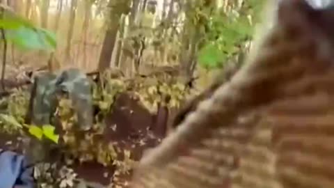Russian soldier hiding in sleeping bag and pretending to sleep busted