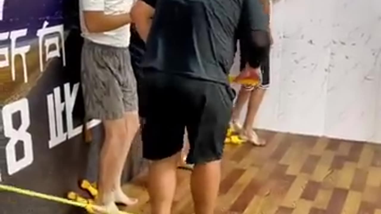 Screaming Chicken Blindfolded Beating Man Challenge Jackie Chan Ruler Bat Blindfolded Man's Simple