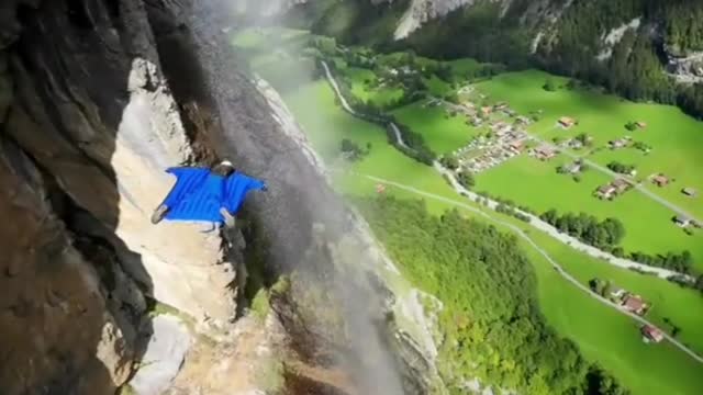 Flying through Swiss waterfall