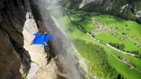 Flying through Swiss waterfall