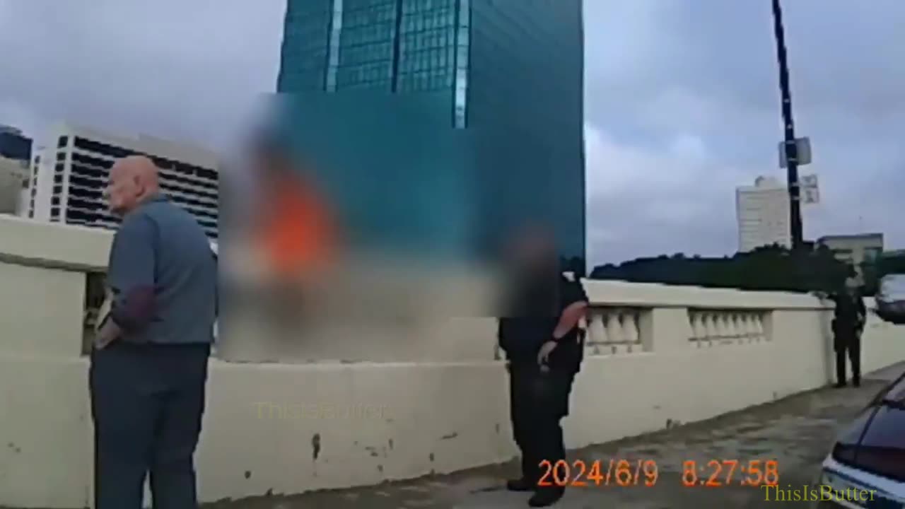 Bodycam video shows Toledo officers rescuing woman from edge of bridge