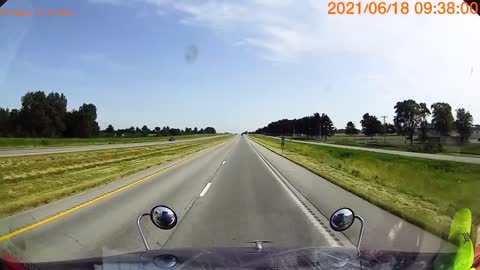 Driver on Wrong Side of the Road Almost Hit by Semi