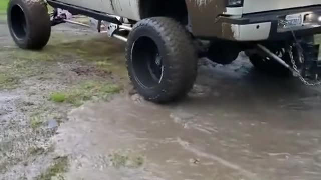 Freight cars run through stagnant water during transportation