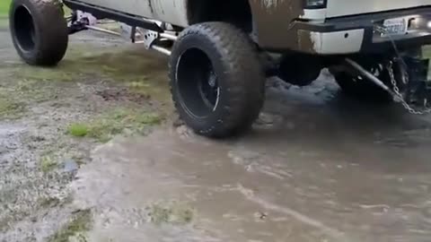 Freight cars run through stagnant water during transportation