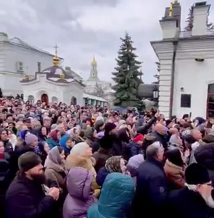 Ukrainian Orthodox Christians praying outside of the Kyiv/Kiev Lavra Caves on March 12, 2023.
