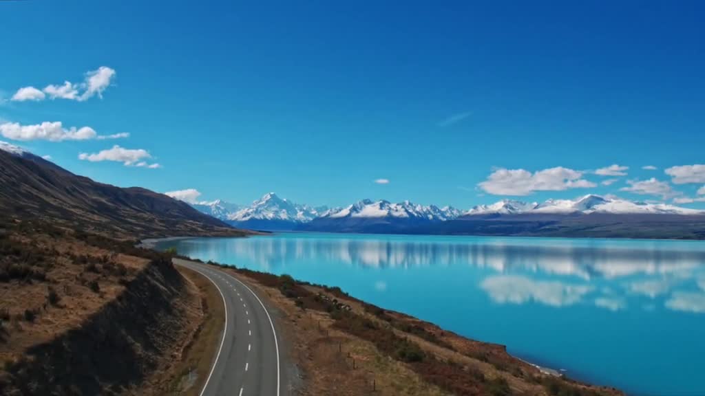 Personally, I think the most beautiful roads and lakes in New Zealand, Highway 80 and Pukaki Lake