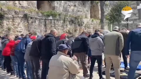 Palestinian worshipers performed Friday prayers outside the entrances of the Al-Aqsa Mosque