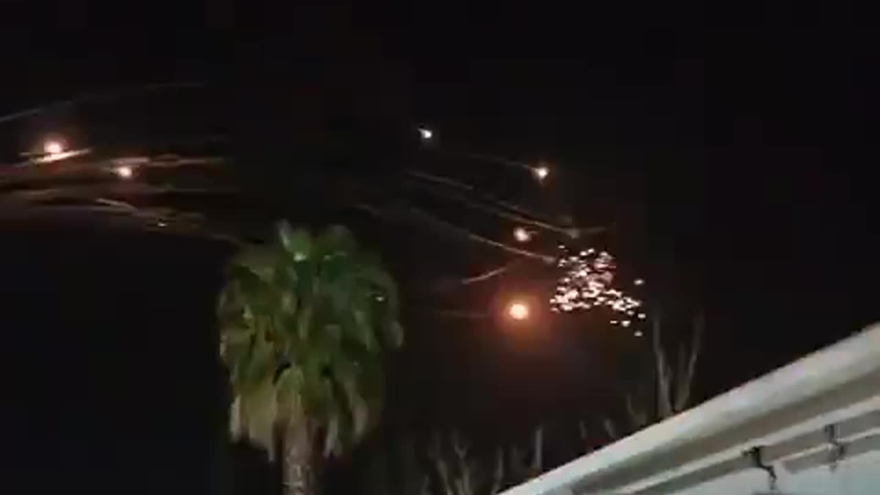 Another clip shows multiple Iron Dome interceptions over Kiryat Shmona.