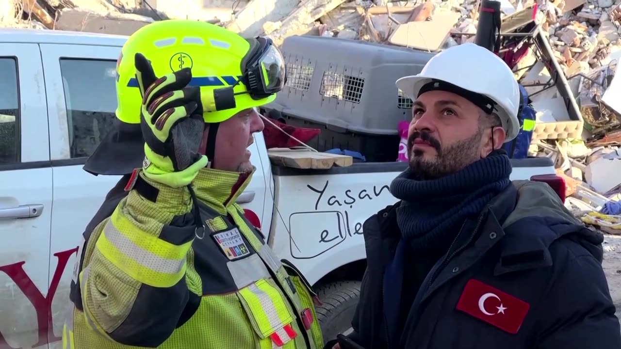 Volunteers try to rescue animals from rubbles