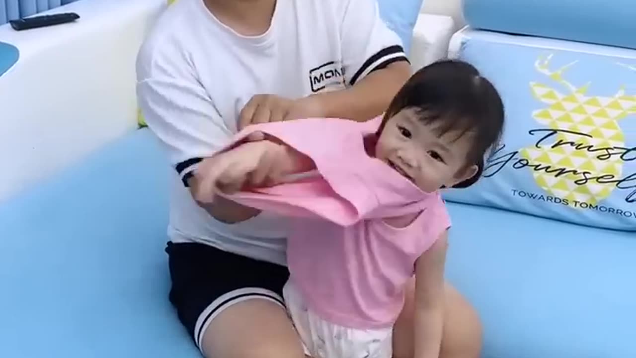 This is the father with the baby. I