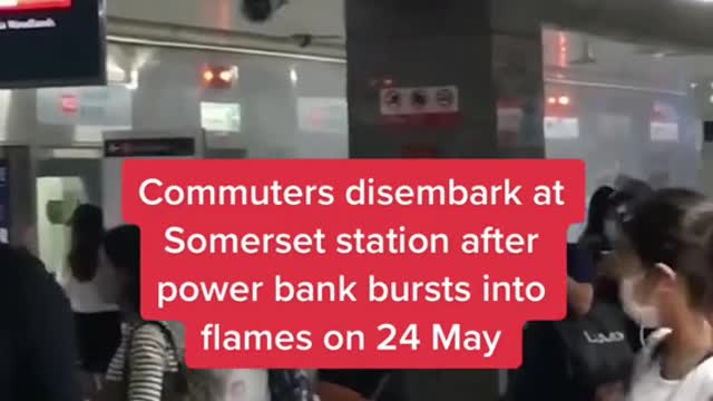 Commuters disembark at Somerset station after power bank bursts into flames on 24 May