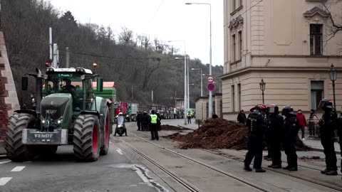 Czech farmers dump manure on Prague streets