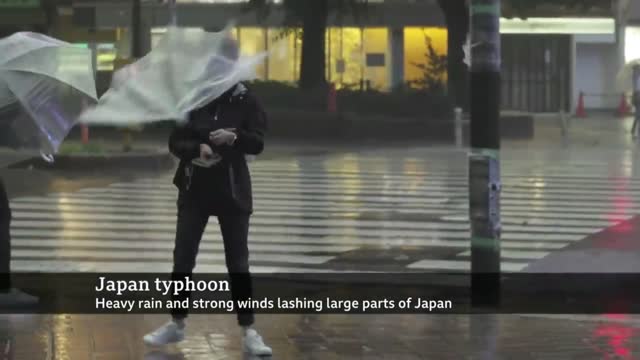 Japan hit by biggest typhoon in decades - BBC News