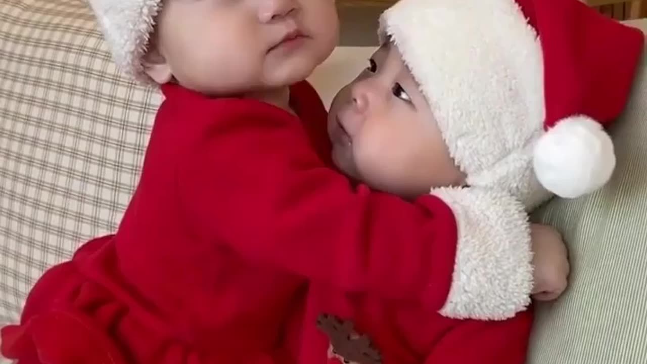 Cute baby brother and sister love each other