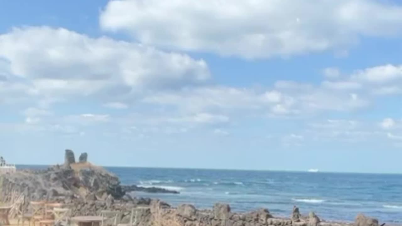 A cozy cafe with a view of the sea