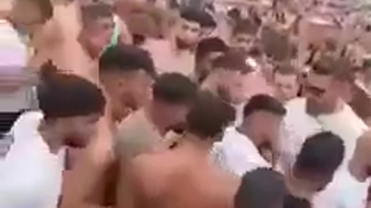 Muslim migrants at a bathhouse, instead of enjoying the pool