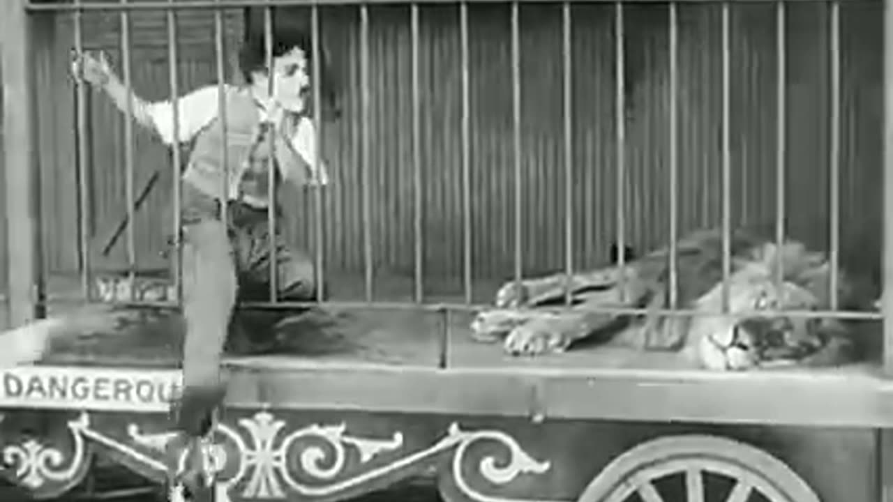 CHARLIE CHAPLIN IN THE CAGE