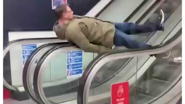 Drunk on escalator