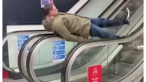 Drunk on escalator