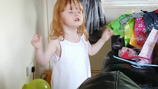 Autistic little girl loves bubbles so do her bulldogs