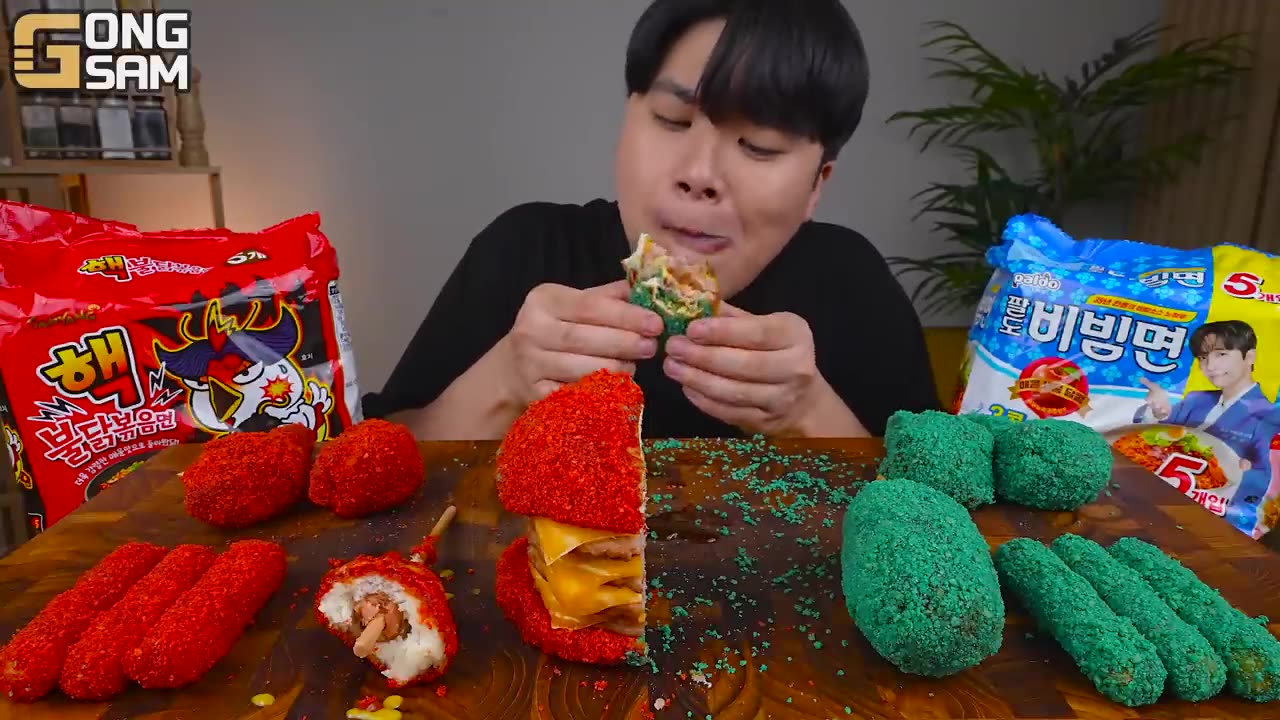A person eating cheestos of Alla varieties