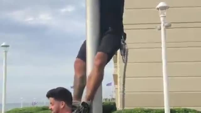 Navy SEAL veteran Dom Raso fixes American flag