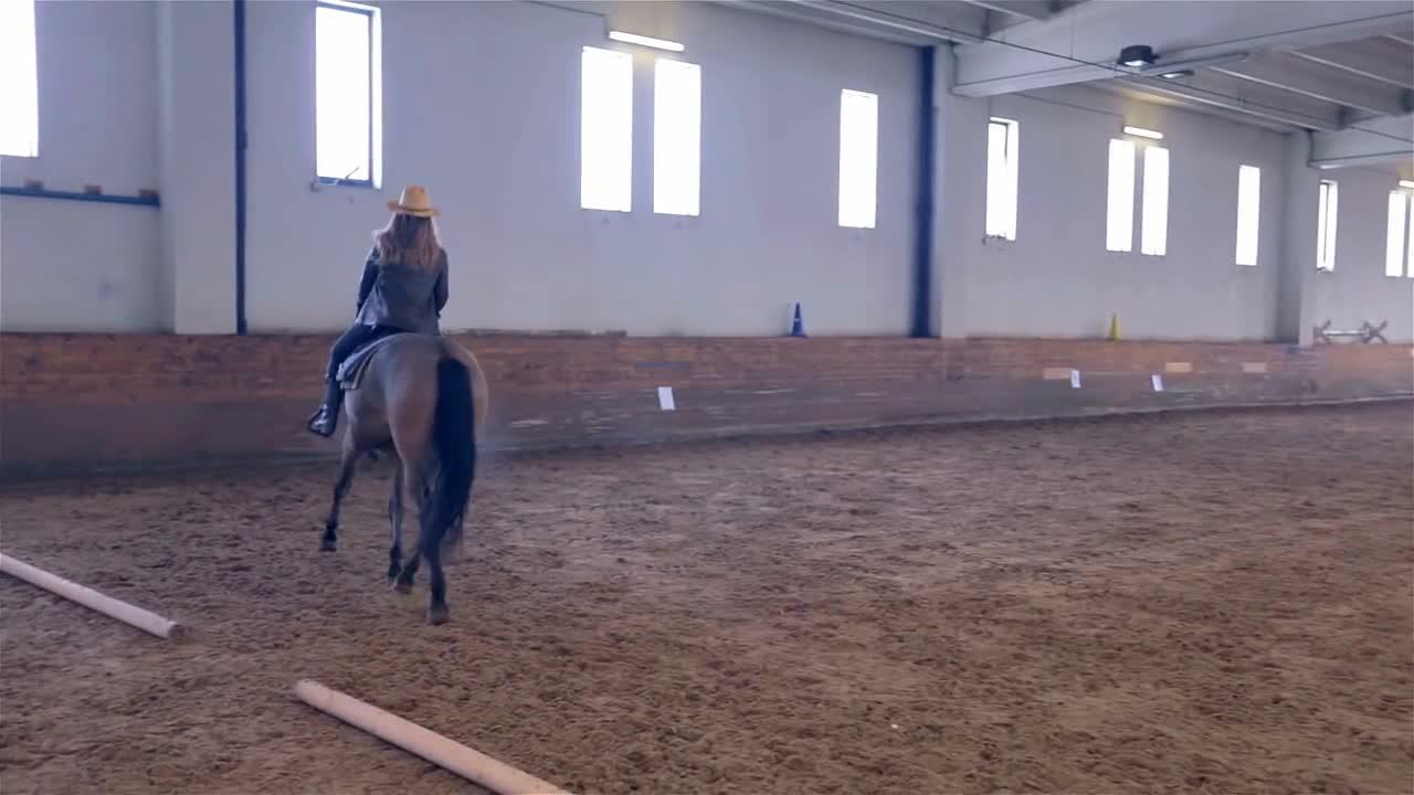 Cowgirl on Horse Riding Passing The Camera