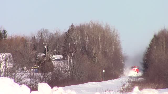 Man Films Train Barreling Down Tracks, Captures Stunning Moment It Collides With Wall Of Snow