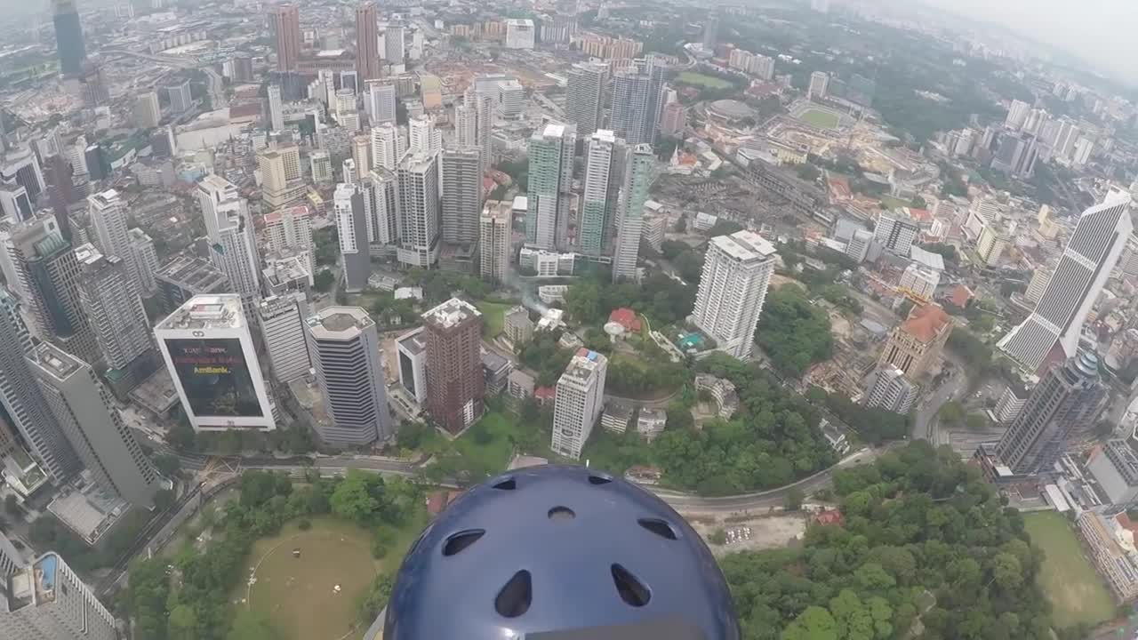 BASE jumps at KL tower in Kuala Lumpur, Malaysia