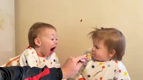 cute baby fighting over food